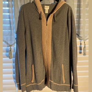 grey zip-up jacket with pink and silver trim